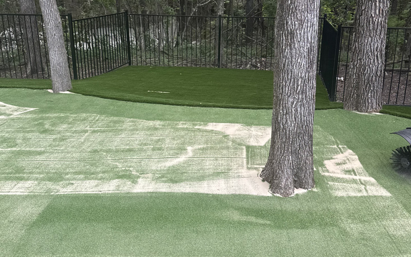 Artificial turf installation project in Dallas Texas backyard