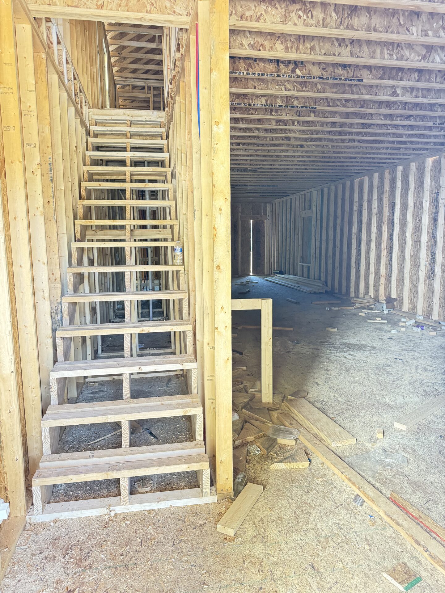 Framed staircase and first-floor wall framing