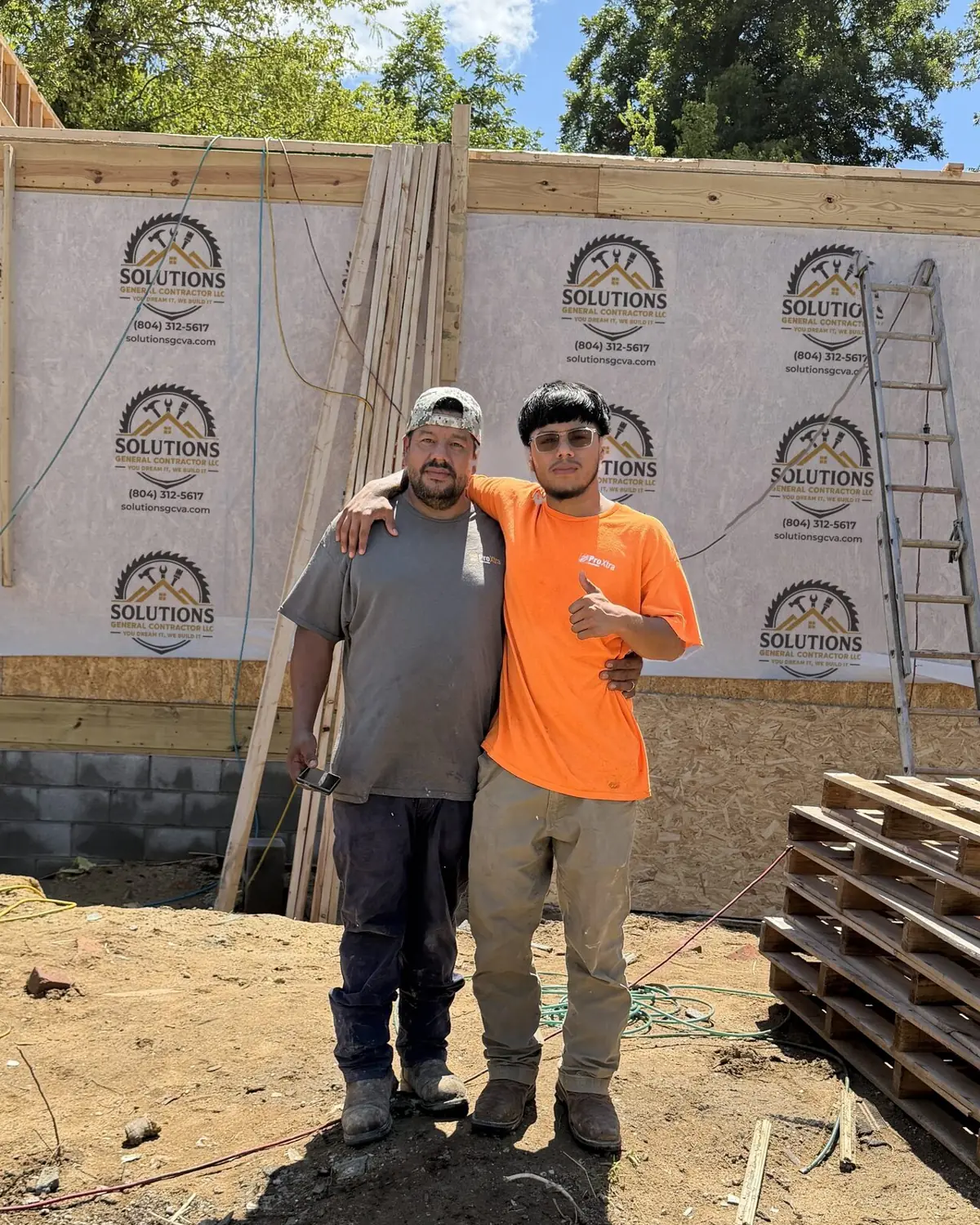 Sigfredo and Misa, Solutions GC father-and-son roofing, renovation, and new construction crew in Chester, Virginia