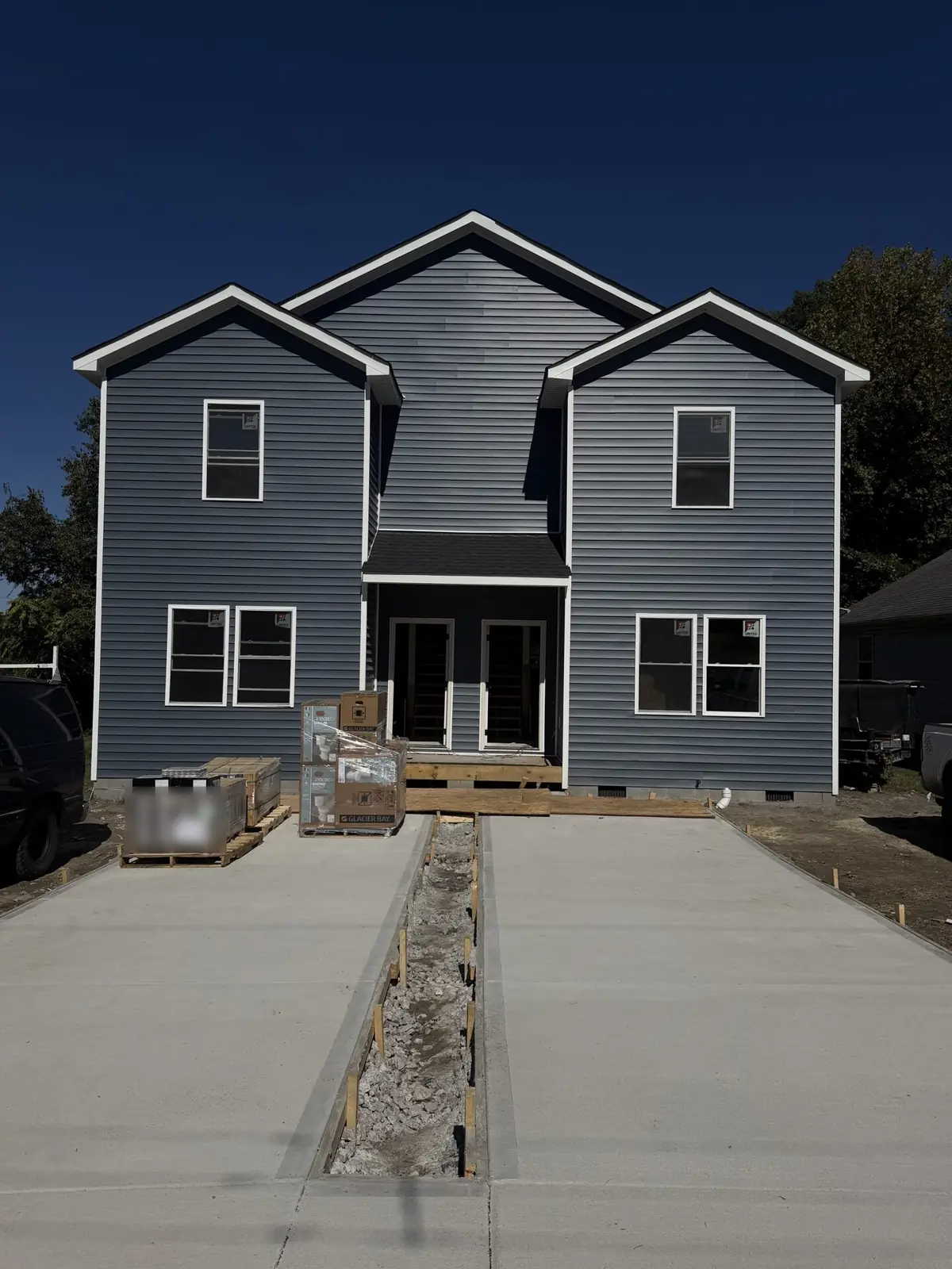 New construction, Petersburg, VA: two-story duplex with new driveways