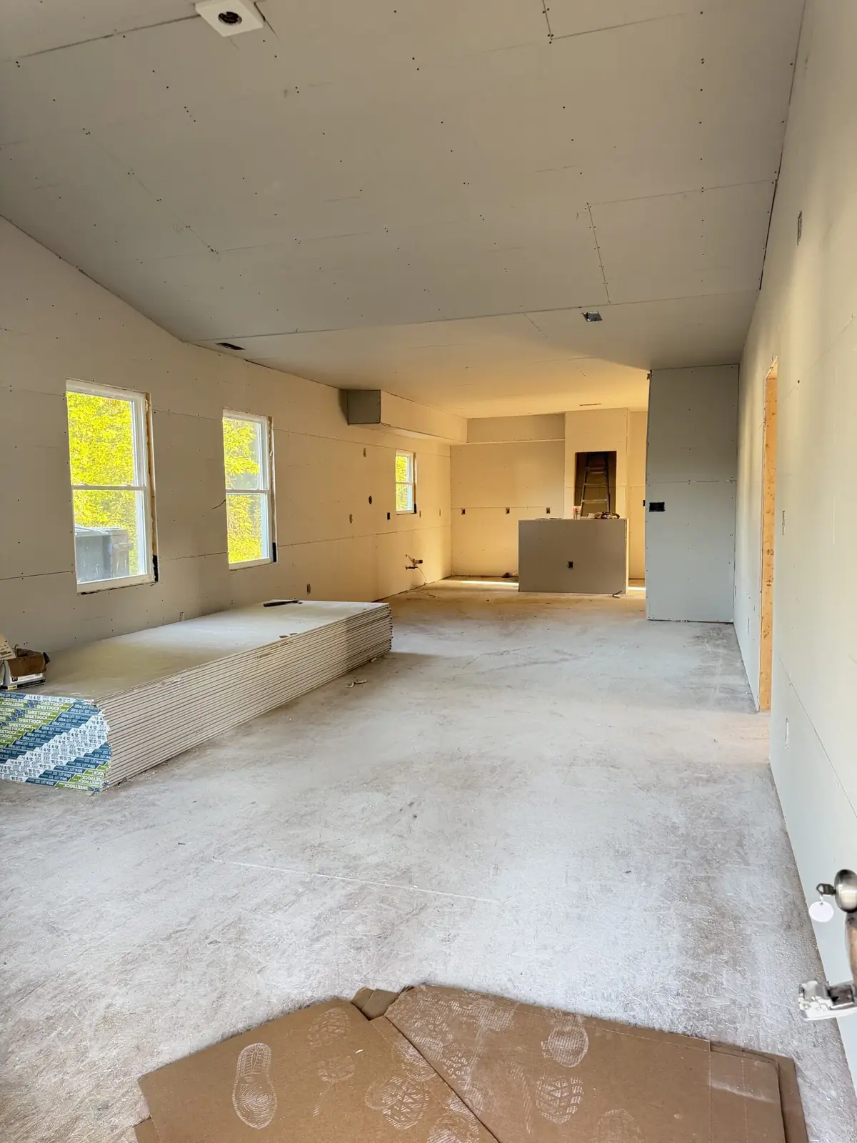 New construction, Richmond, VA: drywall hung in the open living area