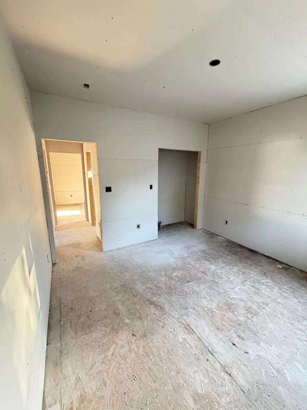 New construction, Richmond, VA: bedroom and closet ready for finishing