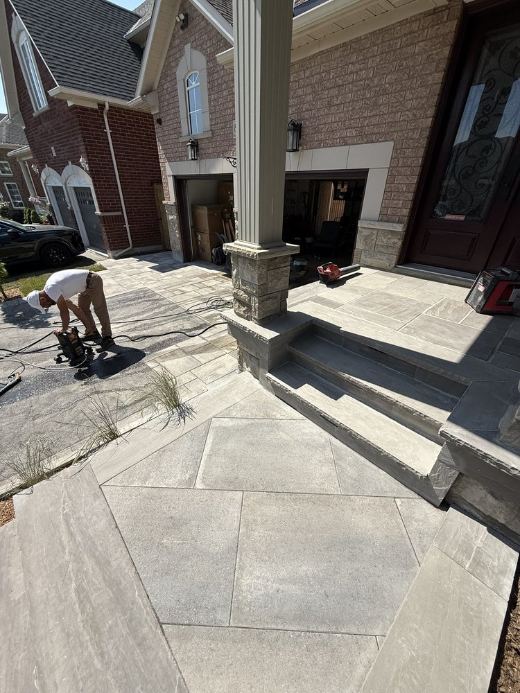 Detail shot of hand-laid stone base course construction