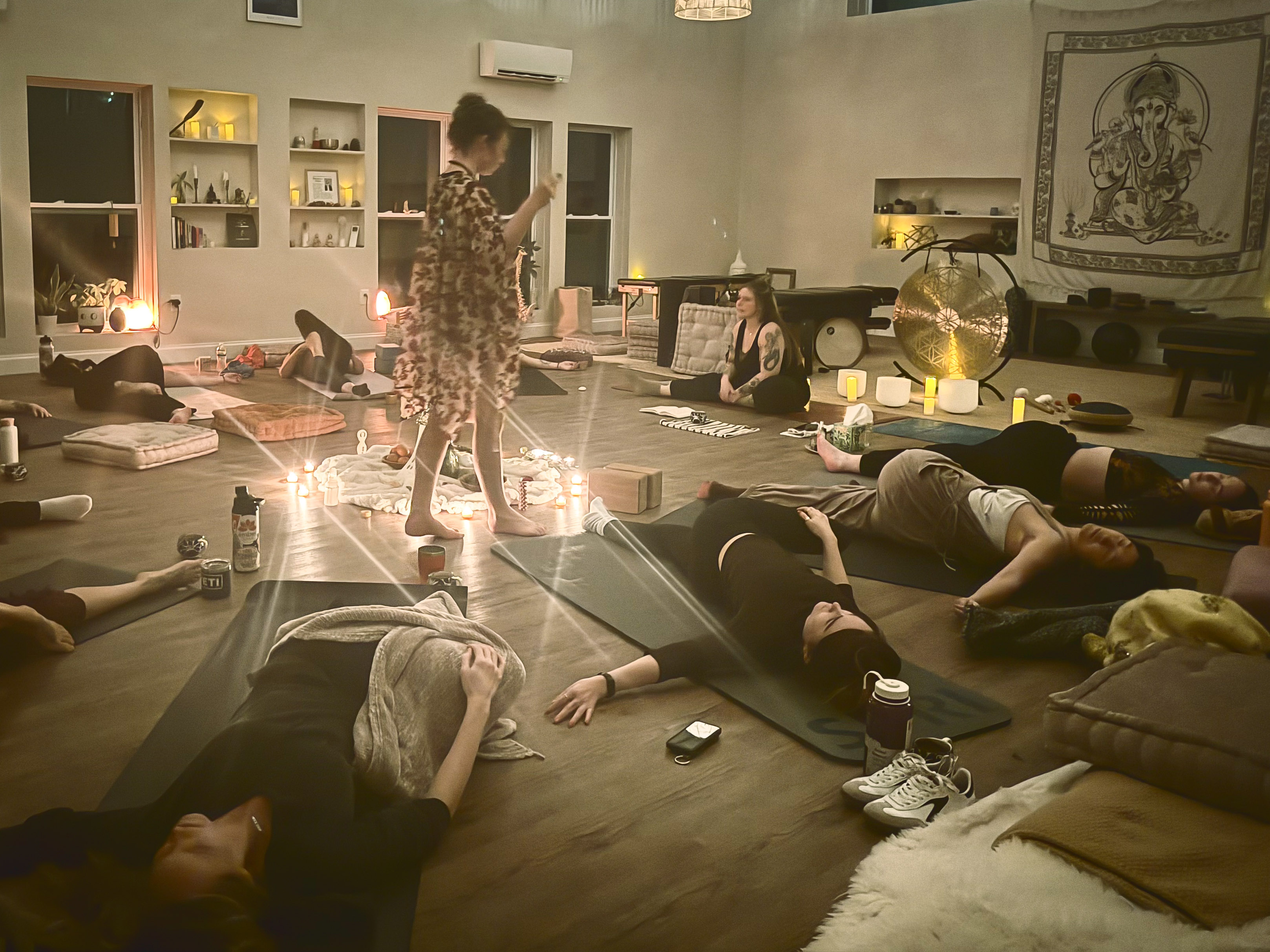 Participants practicing together during a Solara group session