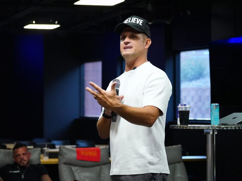 Presenter speaking in a modern training room
