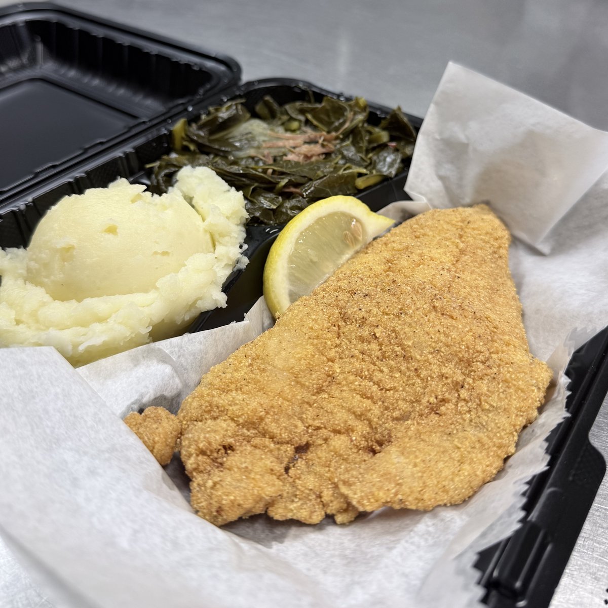 Fried catfish dinner with sides and cornbread at Pee Wee's Soul Food, Rock Island IL