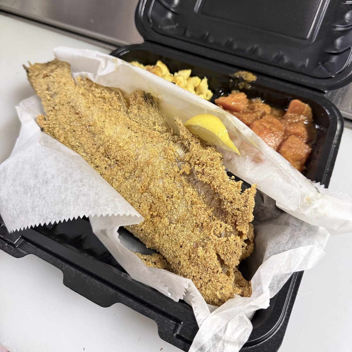 One pound whole fried catfish with mac and cheese and candied yams at Pee Wee's Soul Food, Rock Island IL