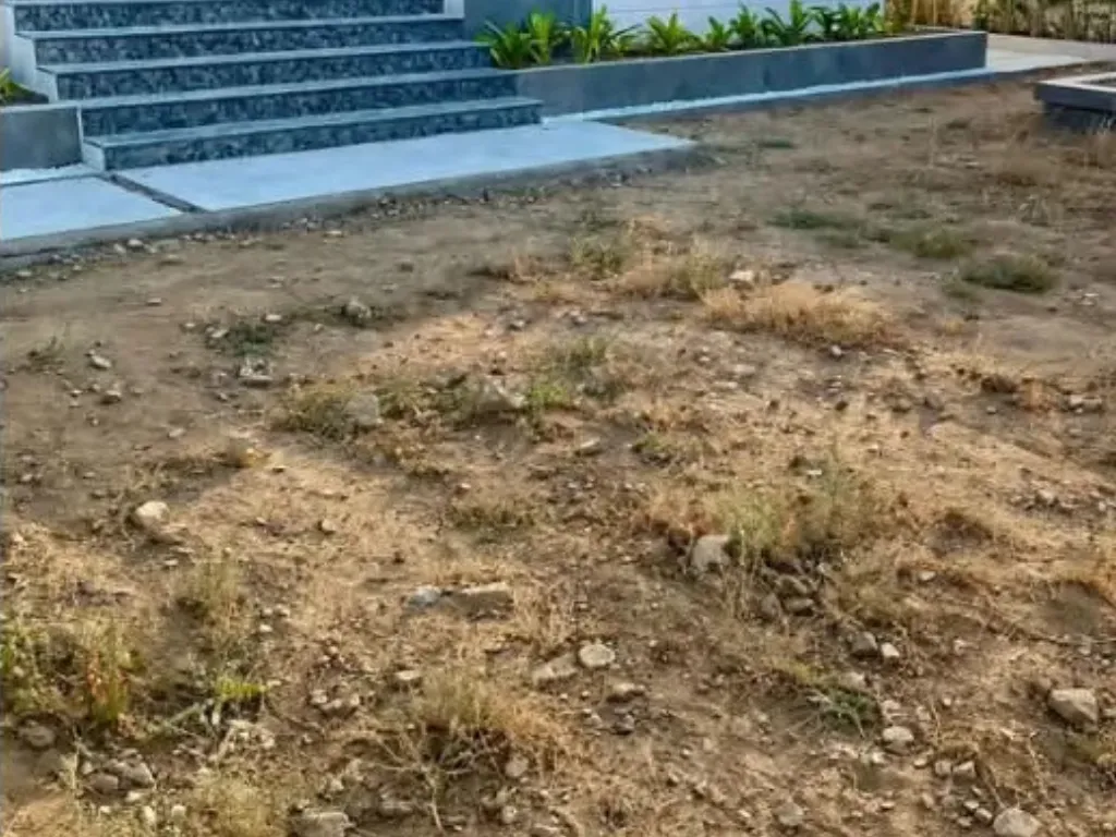 Garden under construction with blockwork walls and bare soil, Mis-tic Landscaping
