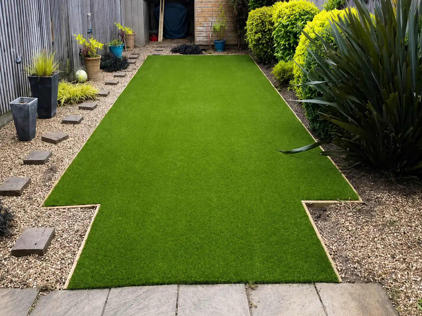 After: the same garden with artificial grass installed by Mis-tic Landscaping
