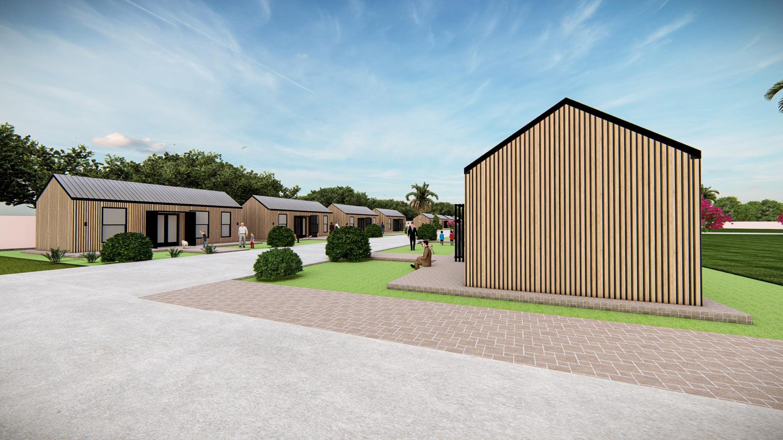 A cedar-clad tiny home with a pitched metal roof and manicured landscaping