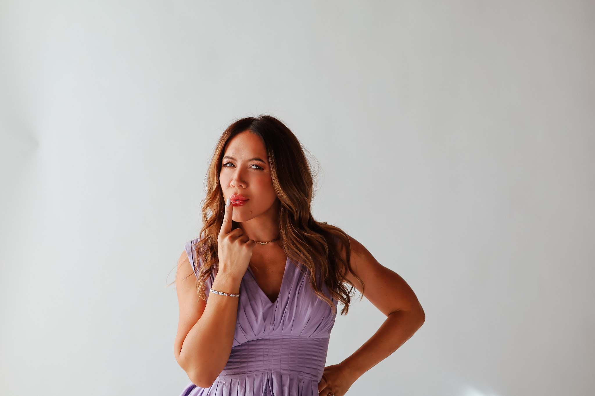 Amber McCue, finger to her chin
