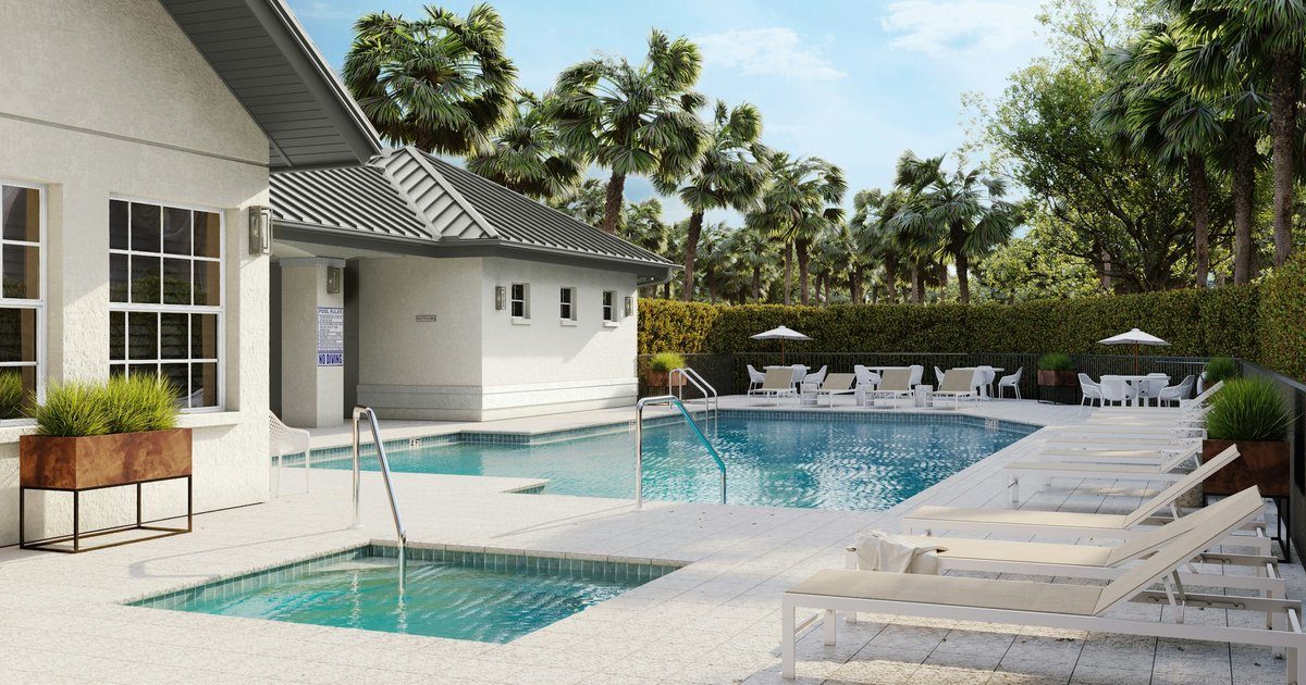 North Naples style community pool with sun loungers and pool building