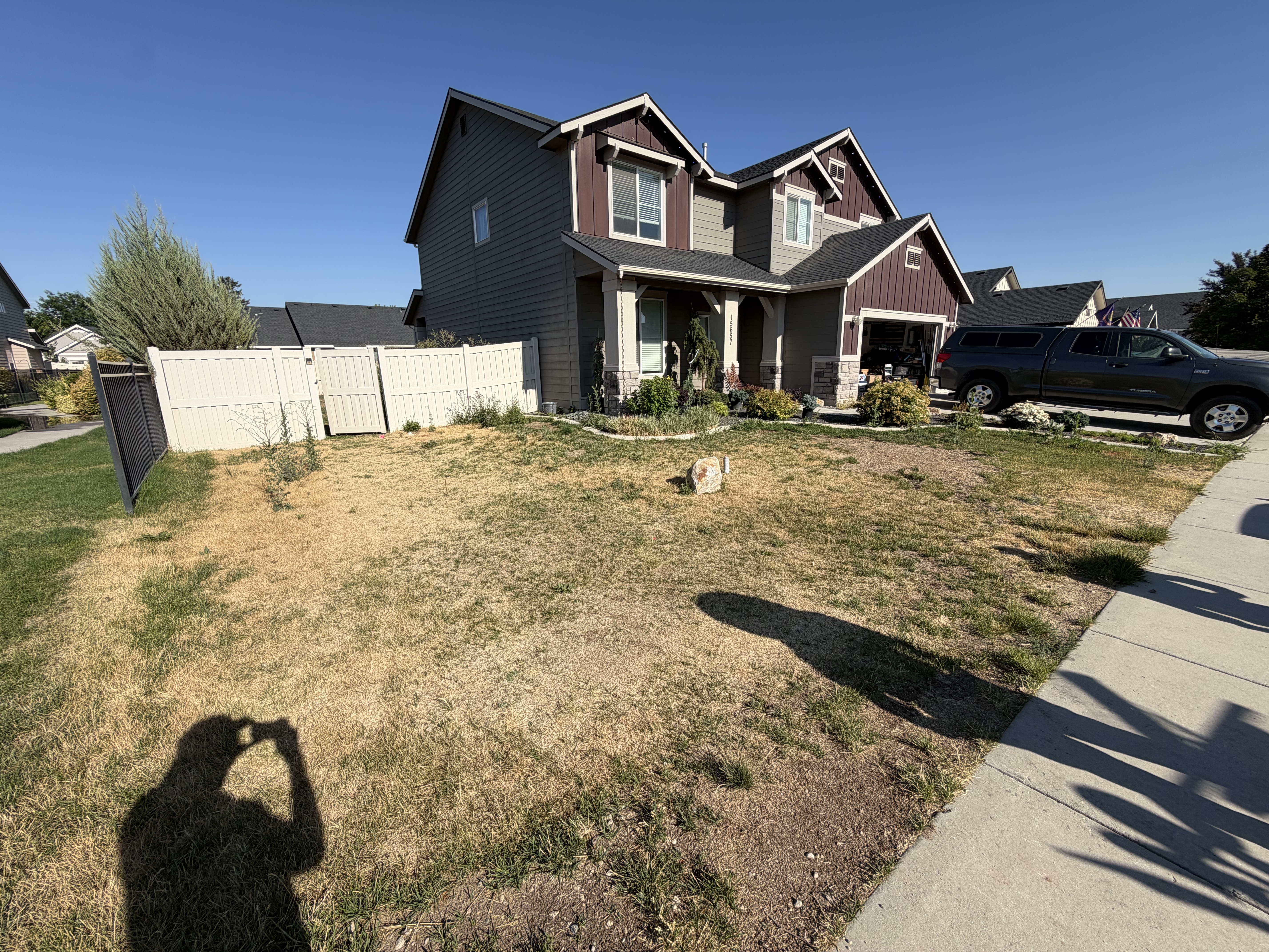 Dead Front Lawn Replaced With Low-Water Rock before work began