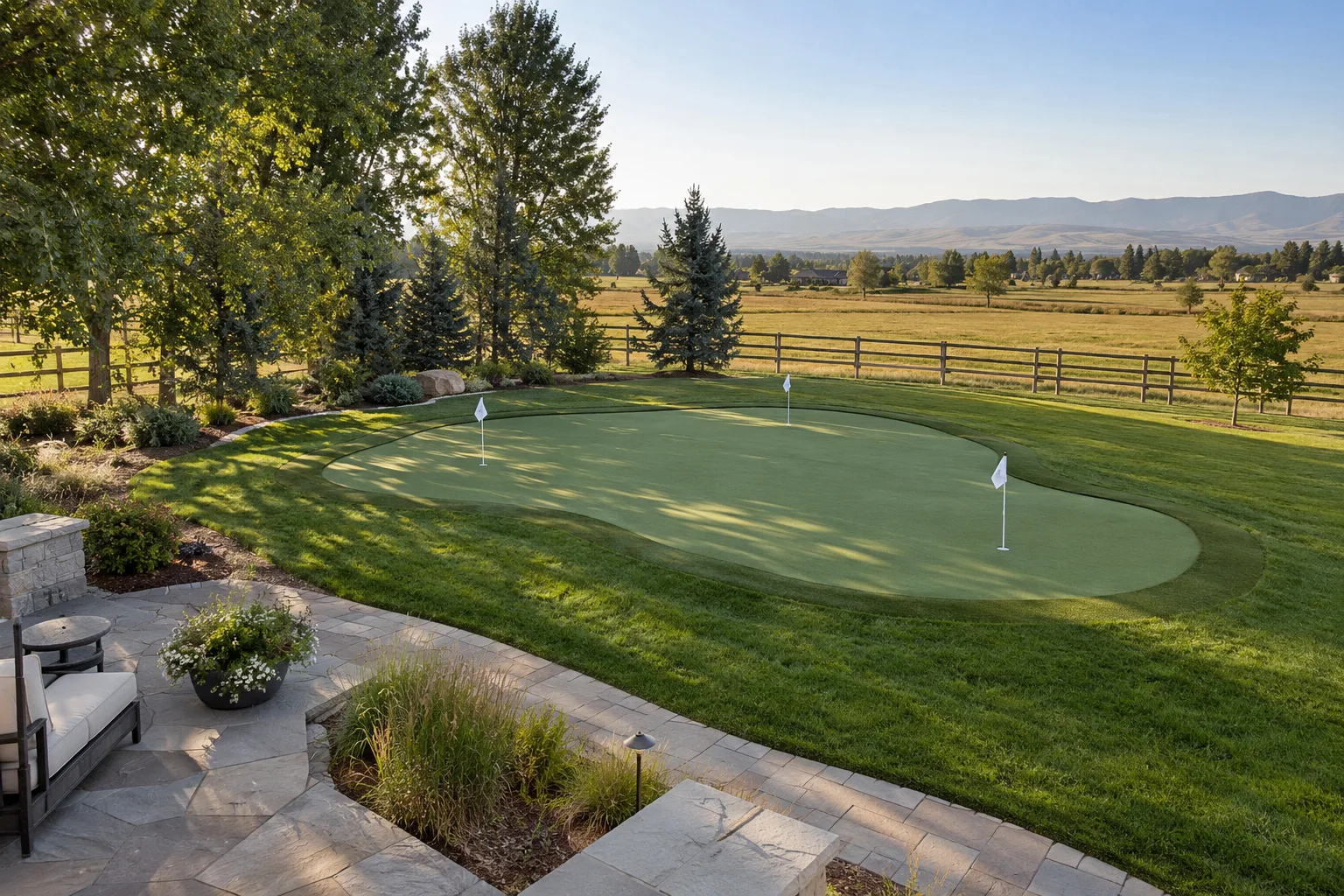Wide Star, Idaho backyard with a synthetic putting green, fringe, patio, lawn, and established trees