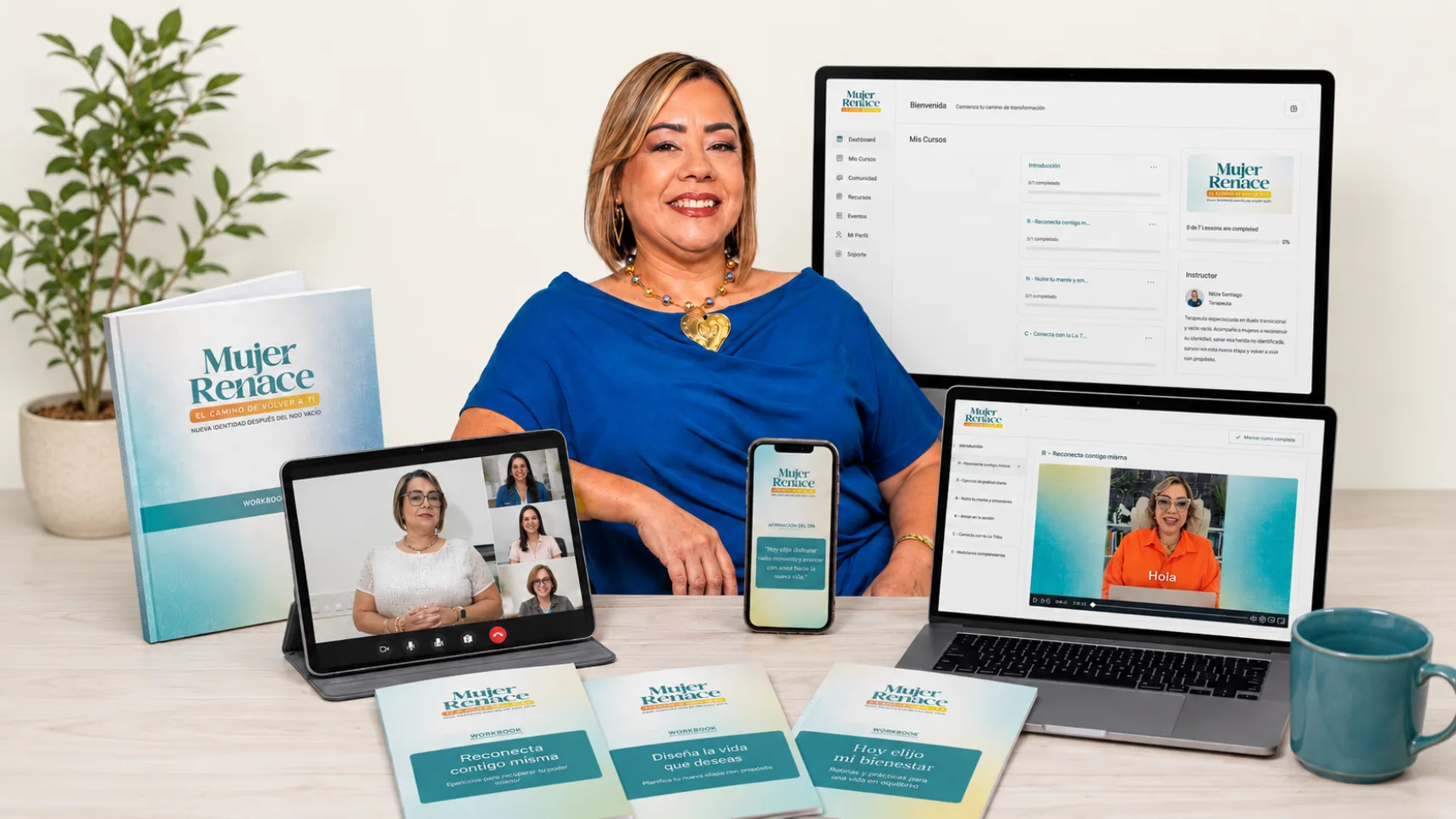 Nitza Santiago junto al área de miembros de Mujer Renace en computadora, laptop, tablet y celular, con los workbooks impresos