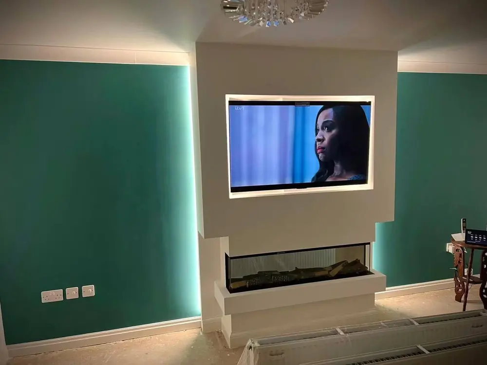 Custom TV wall with fireplace