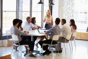 M&A Roundtable group of people meeting around a table