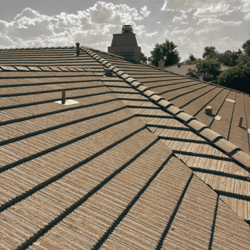 Completed roofing Gilbert AZ project featuring a clean, newly installed tile roof system by a local roofing contractor Gilbert AZ.
