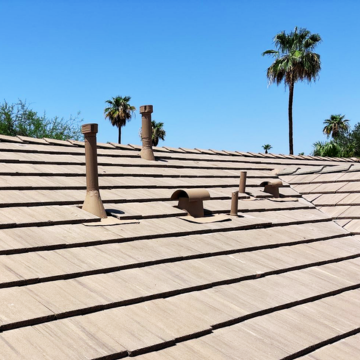 Completed residential roof repair phoenix showing seamless integration of vents and high-quality concrete tiles.