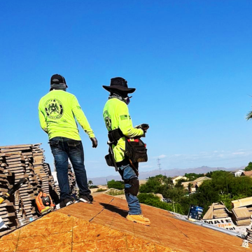 Expert roofers Apache Junction installing new materials on a residential home to ensure long-term weather protection.