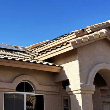Beautiful concrete tile roofing installation Gilbert AZ on a residential home with solar panels.