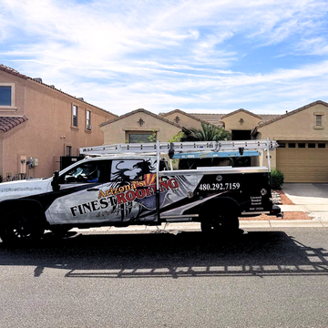 Work truck from the best roofing company mesa az, Arizona's Finest Roofing, parked outside a residential home in mesa az.