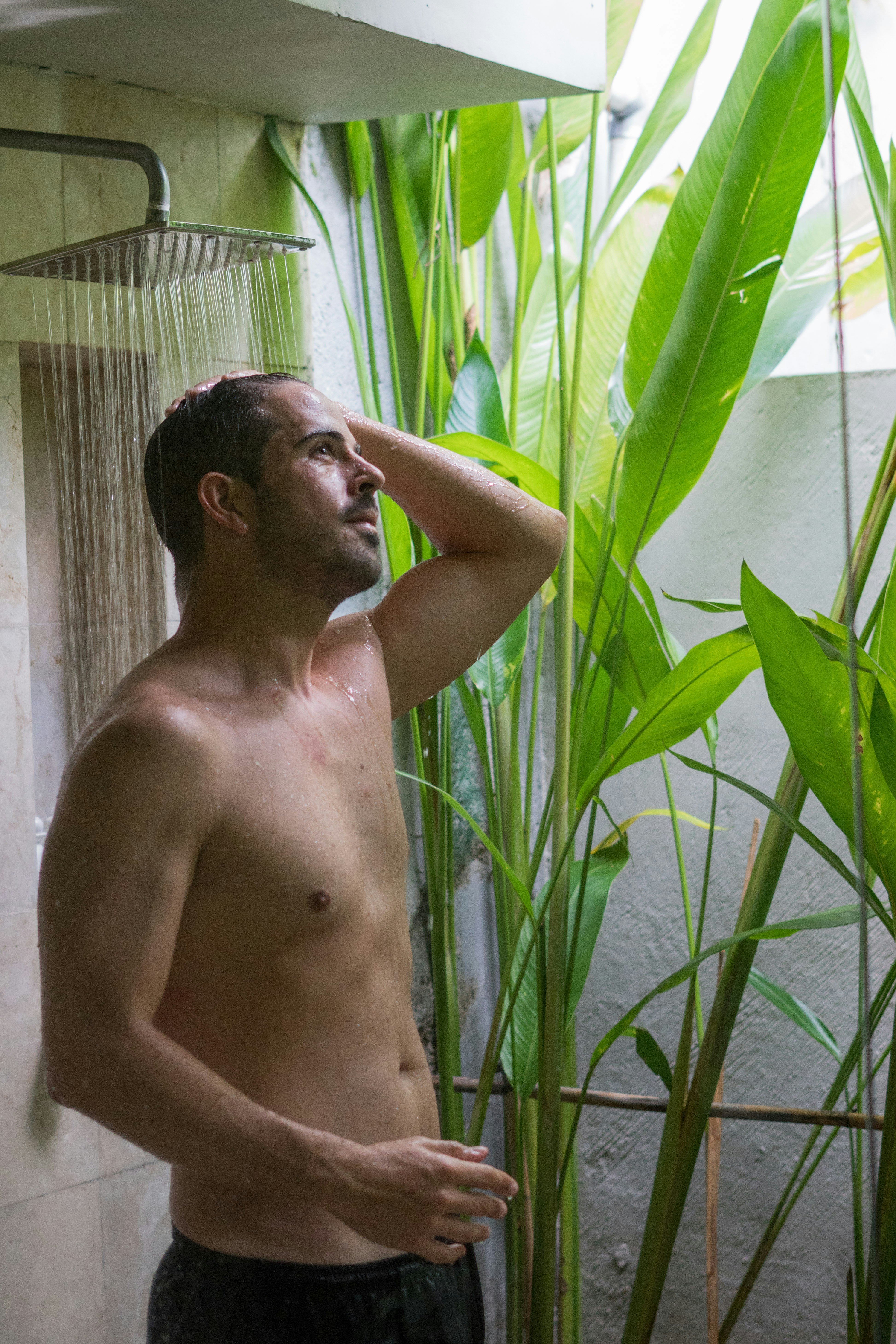Happy person enjoying a shower