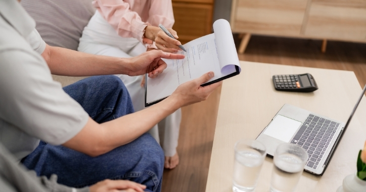 Health insurance advisor explaining importance of buying coverage before illness occurs. Health insurance advisor explaining importance of buying coverage before illness occurs.