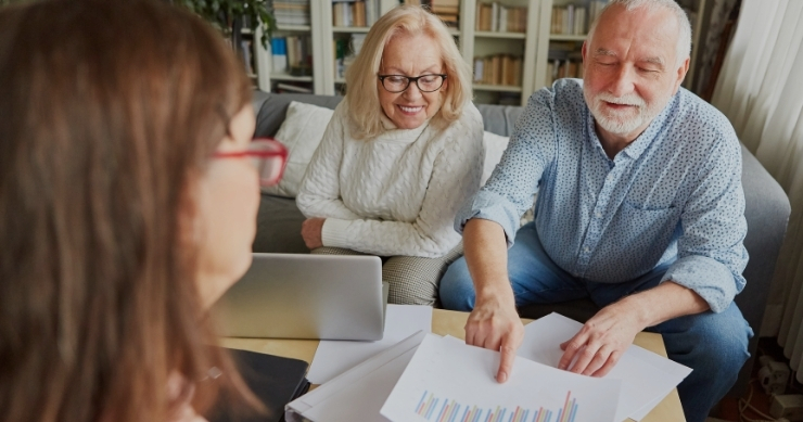 Financial advisor comparing fixed, variable, and indexed annuities for retirement planning.