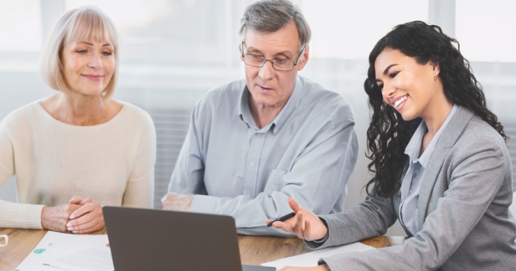 Financial advisor helping retirees develop an asset protection strategy for retirement. Financial advisor helping retirees develop an asset protection strategy for retirement.