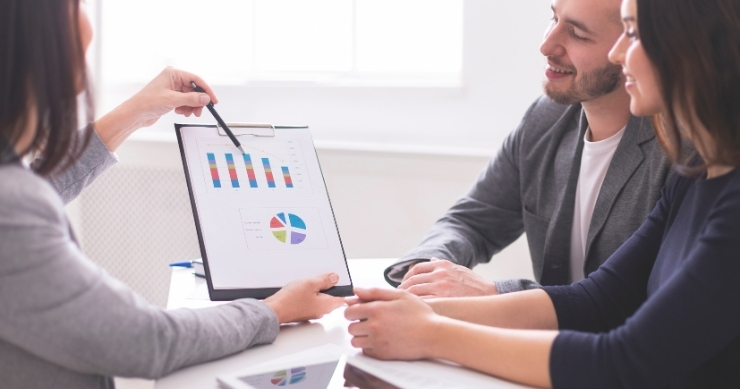 Financial advisor explaining diversified retirement investments designed to protect retirement principal. Financial advisor explaining diversified retirement investments designed to protect retirement principal.