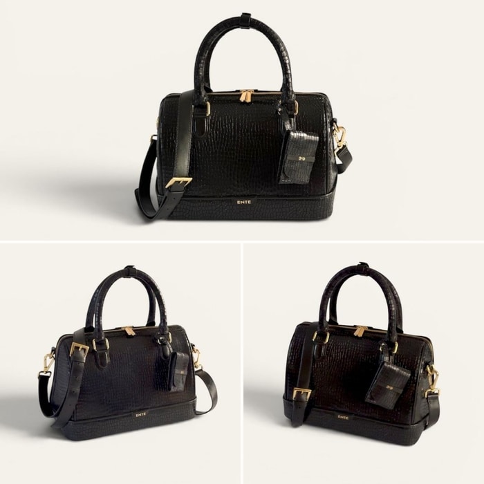 Woman carrying the black ENTE Roomy V2 leather handbag