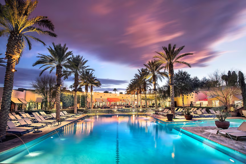 Palm-lined pool courtyard at the Wigwam Resort