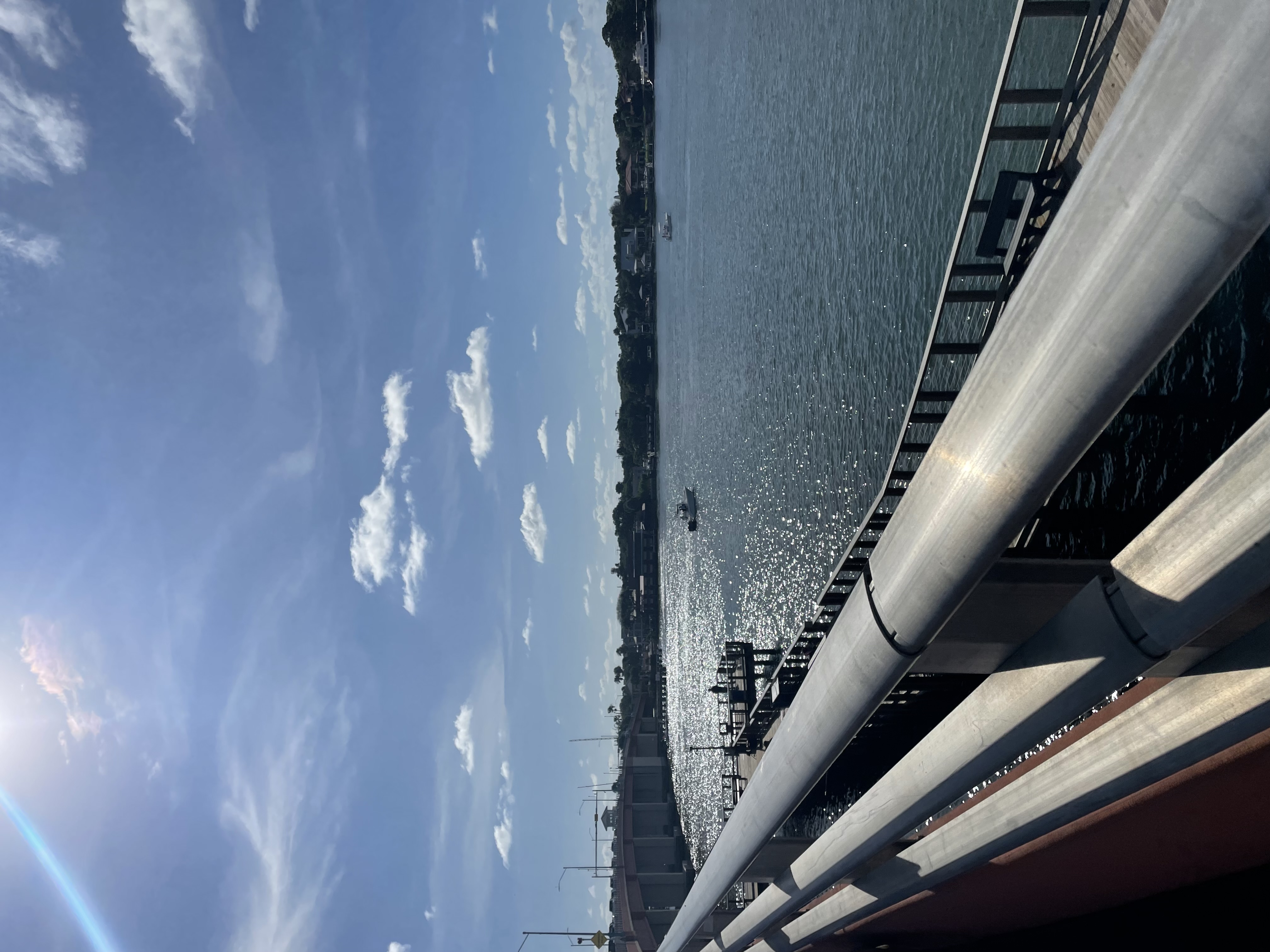 Bridge railing over sparkling water