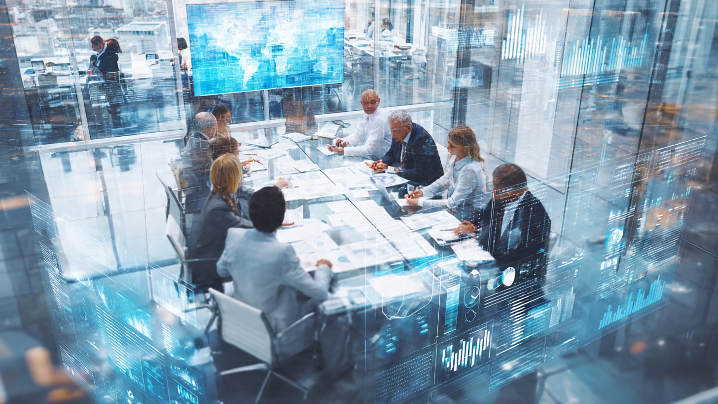 A corporate boardroom scene with diverse leadership team collaborating around a glass table with strategic planning documents and digital displays showing data visualizations, natural lighting, modern professional office, atmosphere of strategic collaboration and innovation