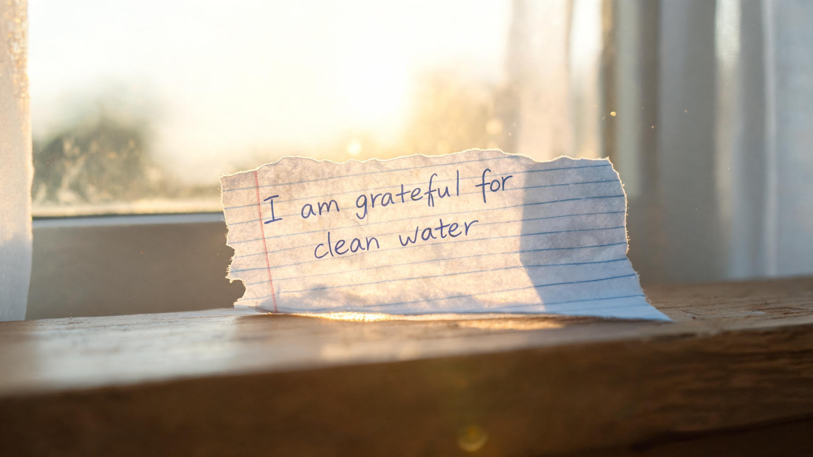 A handwritten note on a windowsill in morning light, representing the act of naming what you've been blaming. A handwritten note on a windowsill in morning light, representing the act of naming what you've been blaming.