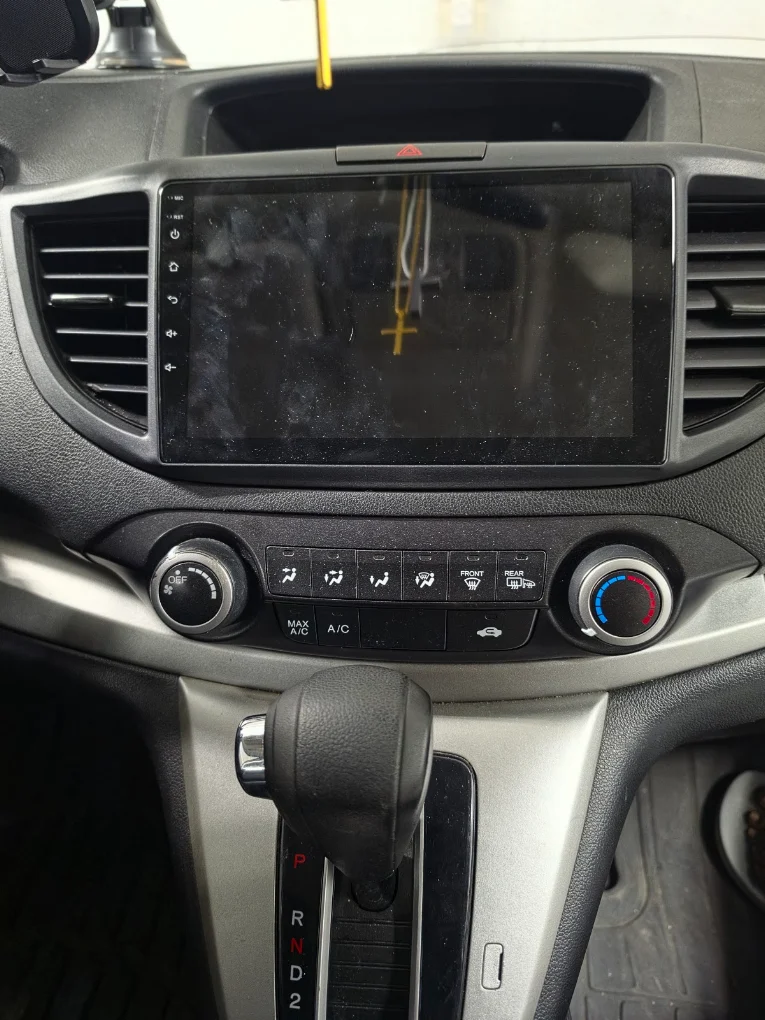 Aftermarket touchscreen installed in an SUV dashboard by JCo Auto