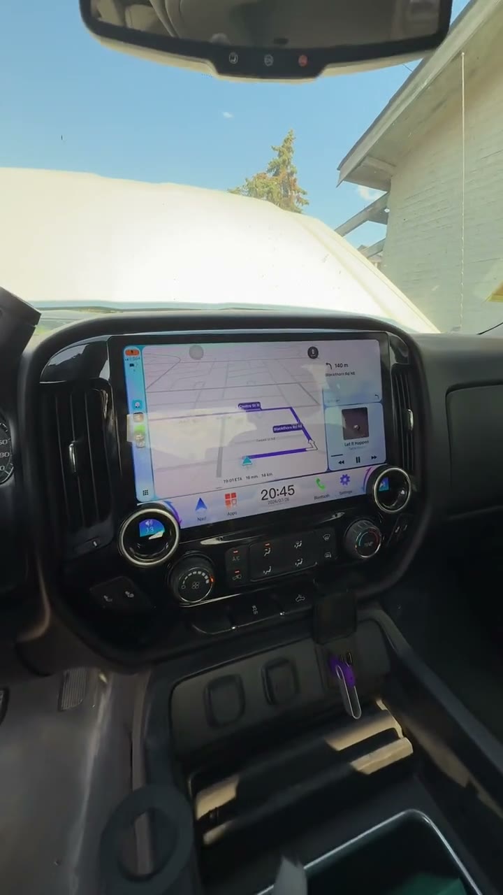 Large touchscreen radio installed in a truck dashboard