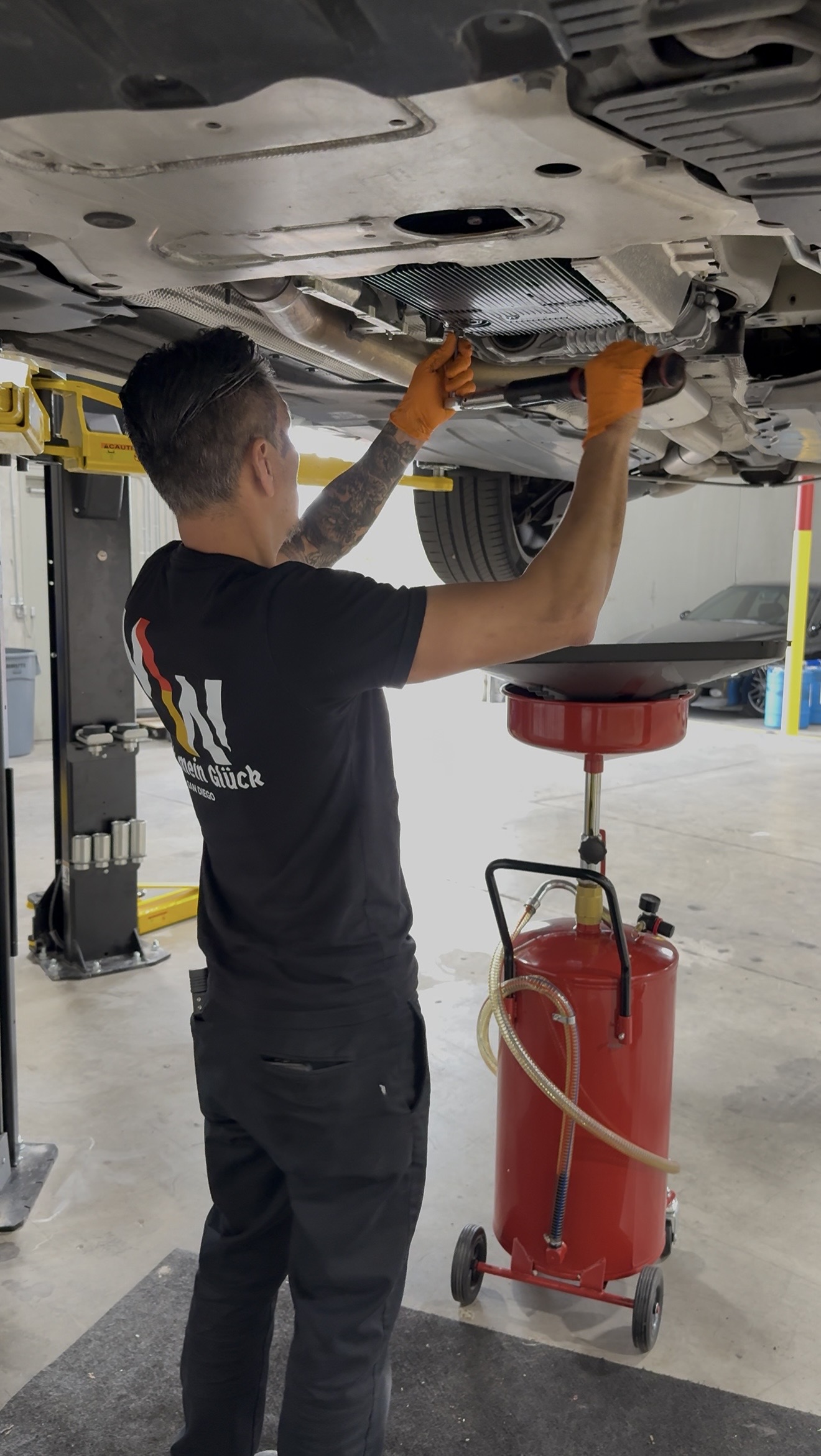 Mechanic working on a car Mechanic working on a car