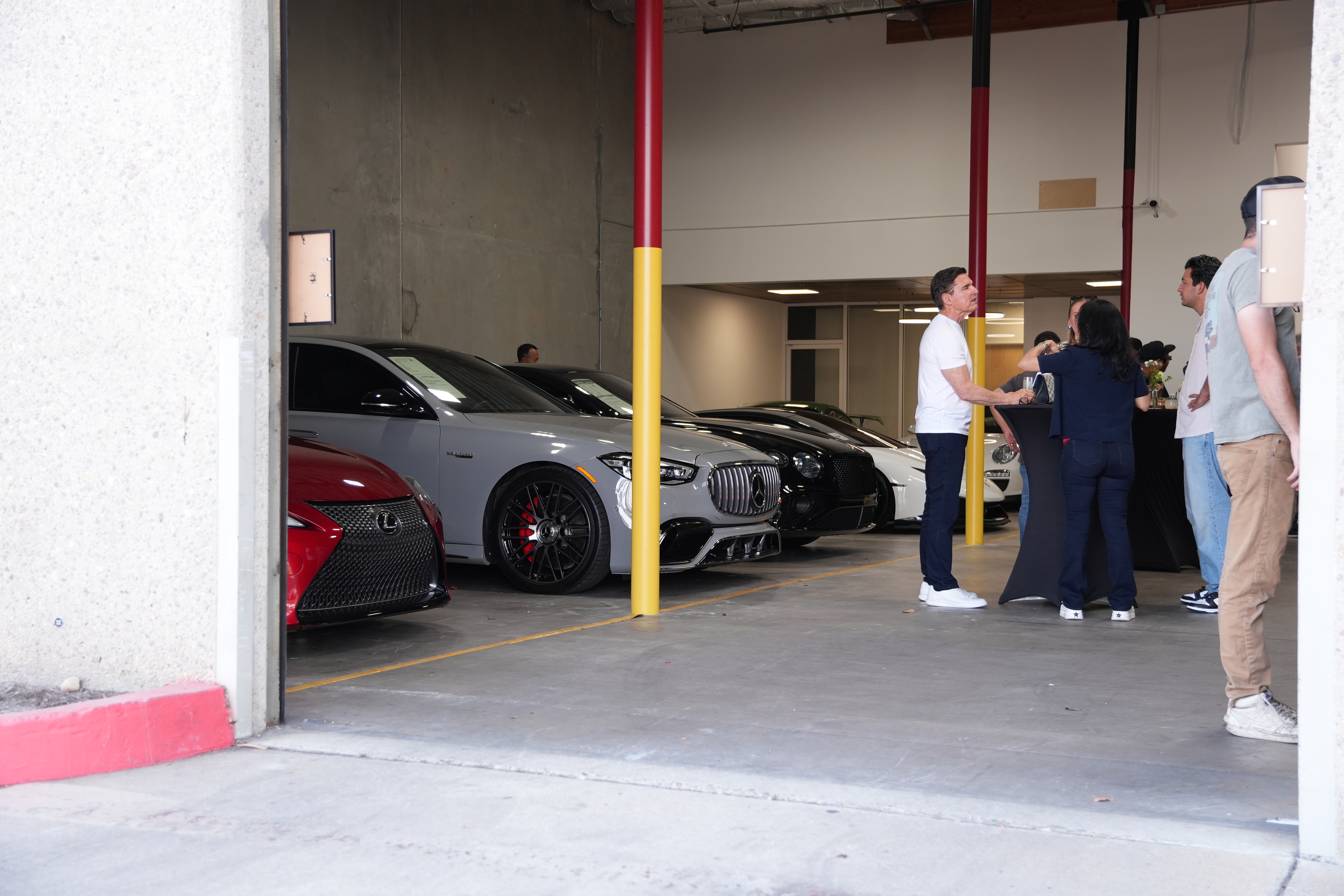 Clean and secure indoor vehicle storage bays with classic and modern cars Clean and secure indoor vehicle storage bays with classic and modern cars