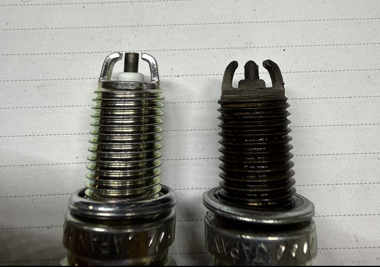 BMW engine prepared for spark plug replacement with OEM parts BMW engine prepared for spark plug replacement with OEM parts