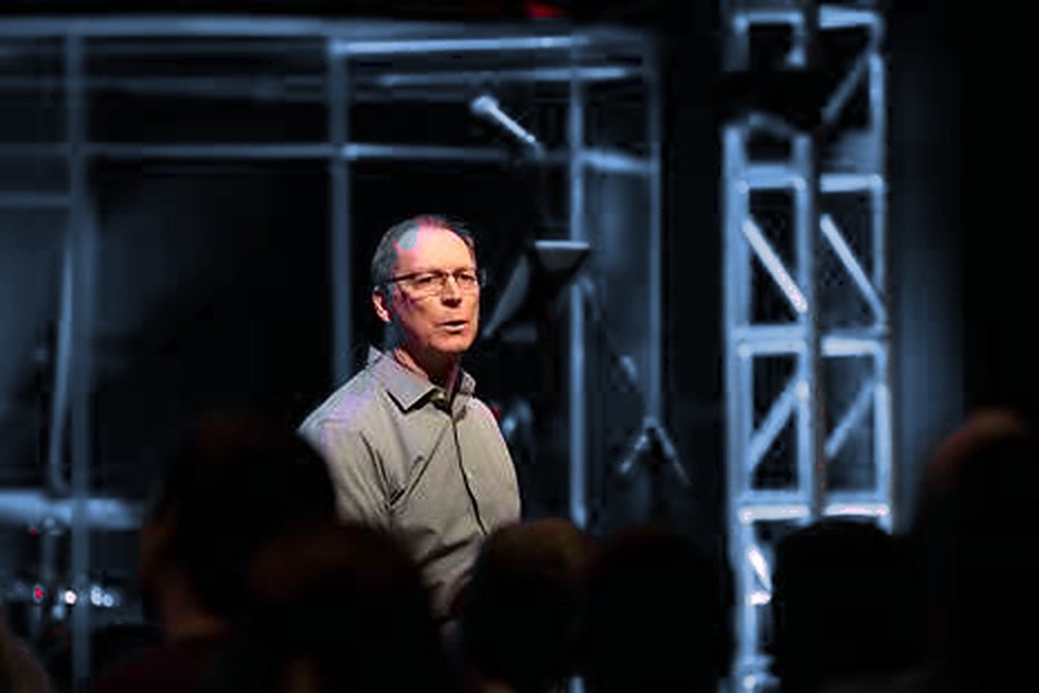 Ken L. Roberts speaking to a live group