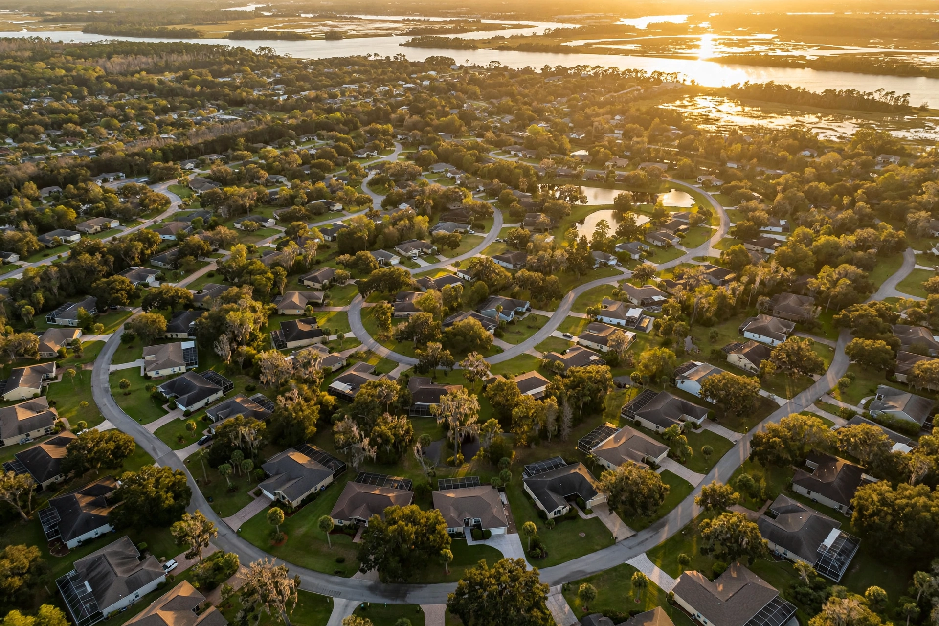 Aerial view of a Jacksonville Florida neighborhood with single family homes, illustrating the housing market where disabled veterans can combine VA loans with Florida property tax exemptions