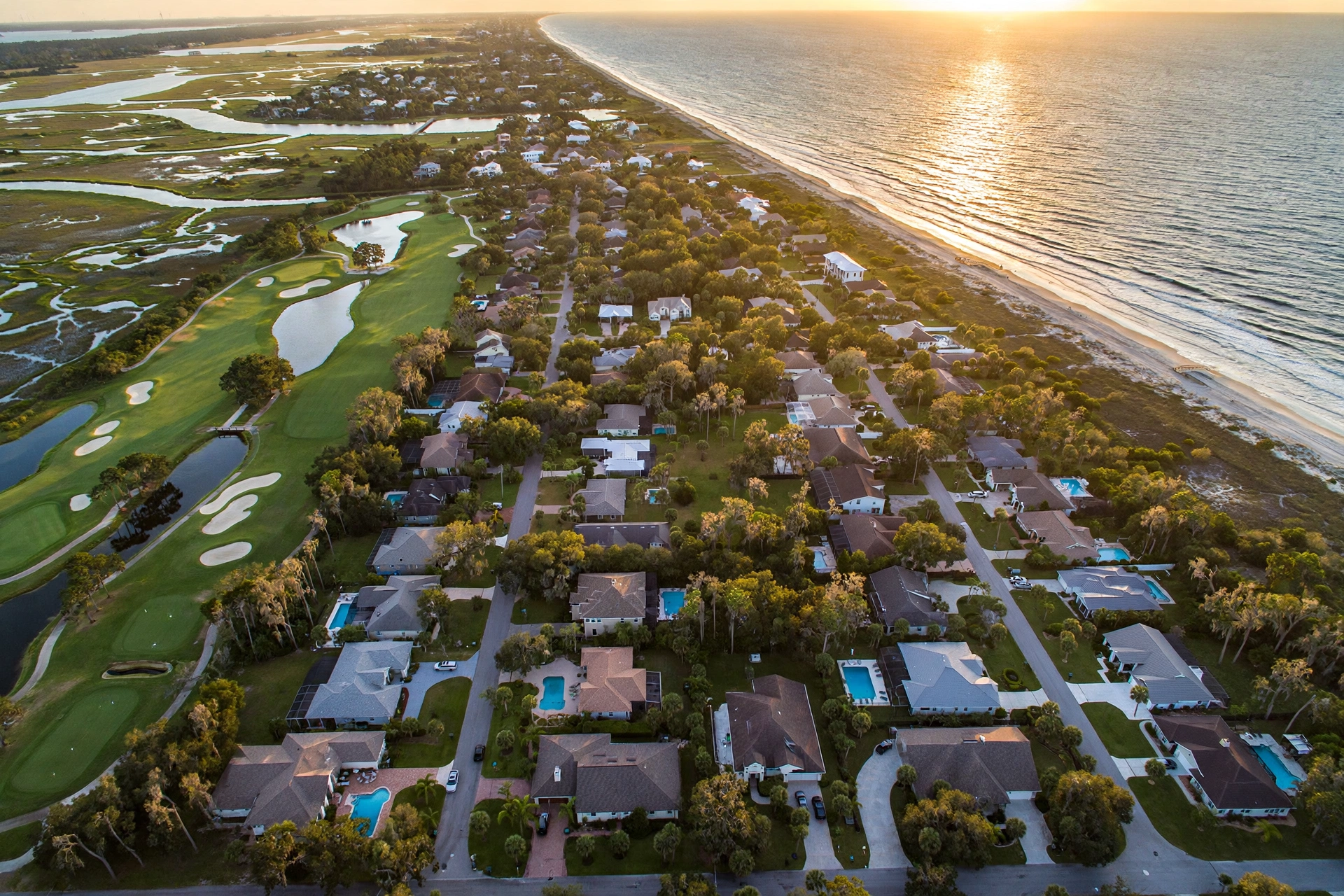 Aerial view of a coastal Jacksonville Florida neighborhood at golden hour