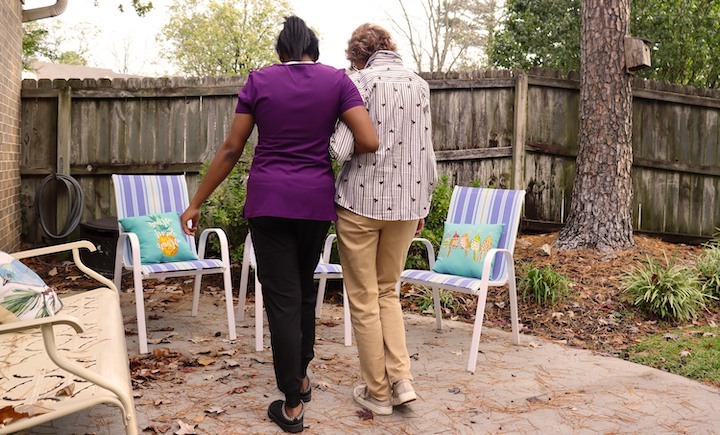 T Love Home Care Services caregiver providing compassionate care