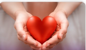 Hands holding a red heart