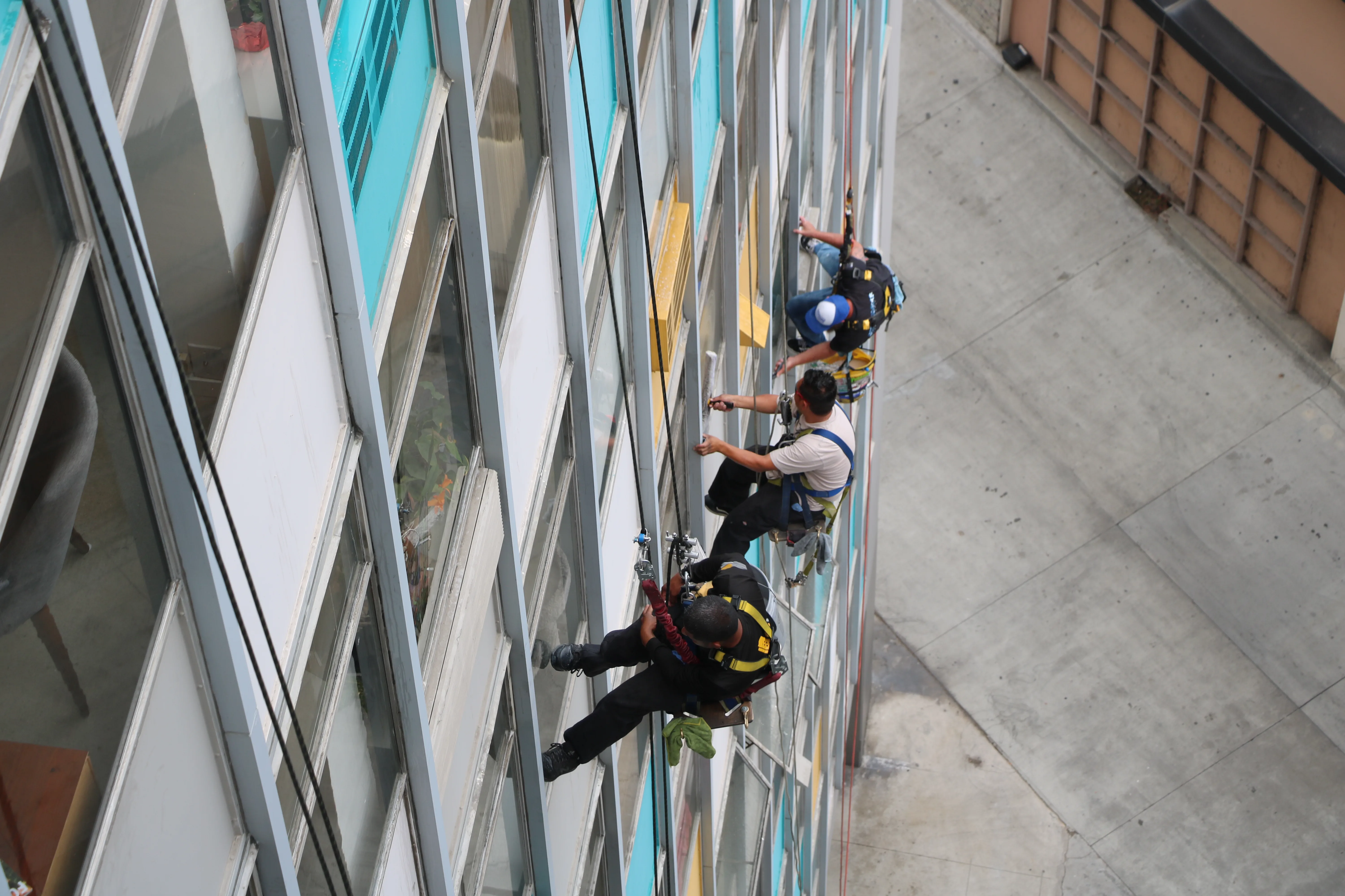 High-access exterior building cleaning