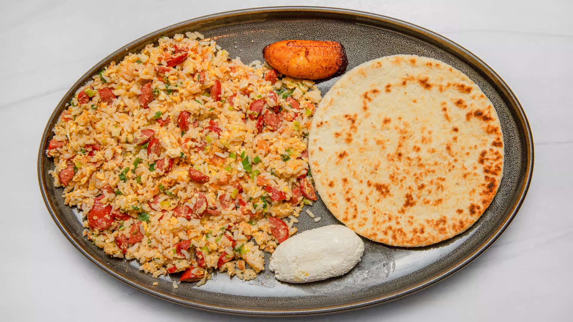 Chorizo con Arepa artisanal smoked sausage