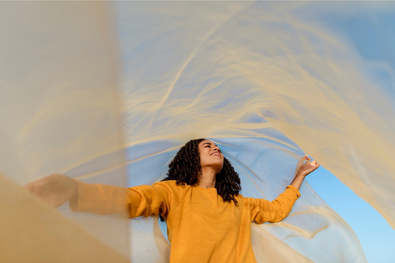 Image of joyful individuals enjoying a 10X Breathwork session, learning to live in constant happiness and alignment with their true essence