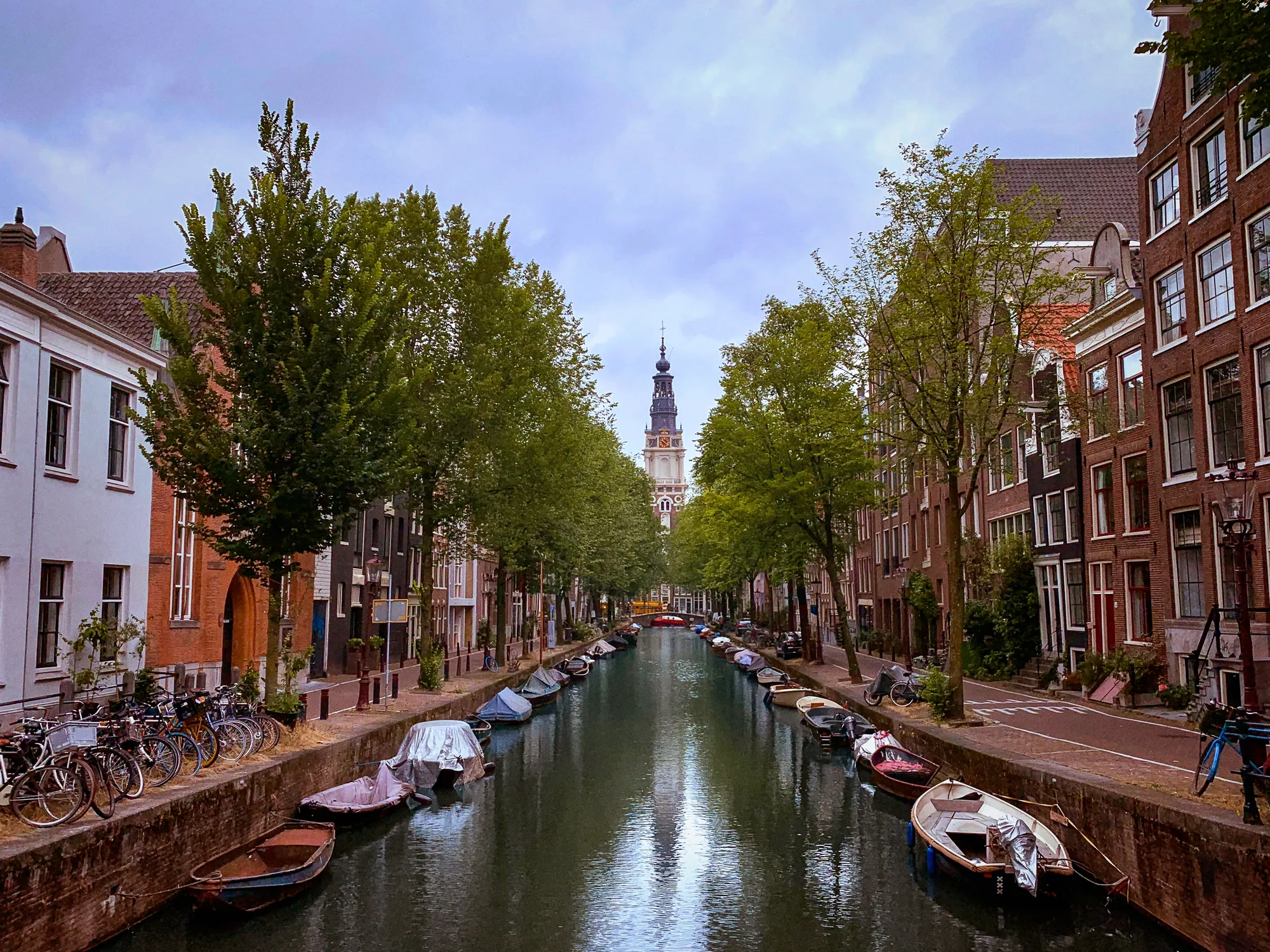 Amsterdam canal lined with historic Dutch buildings